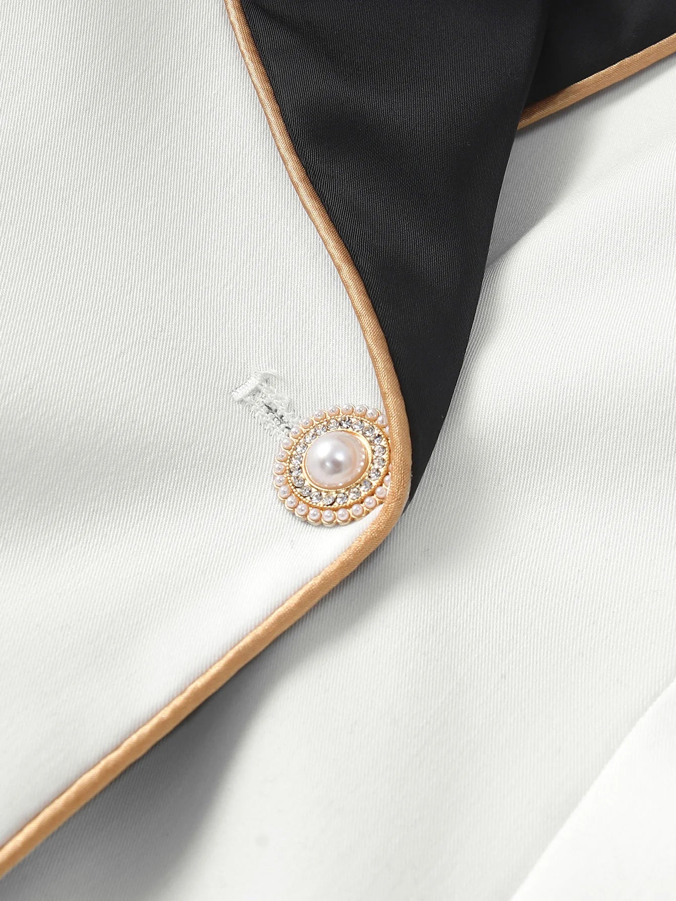 Sophisticated and Elegant Women's Beige Blazer with contrasting lapel
